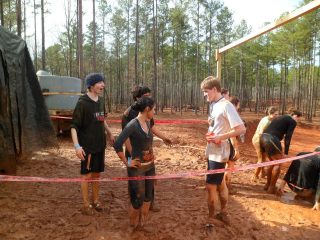 Elliot, left, with me and Patrick, right, hanging out before the big mud slide at the end.